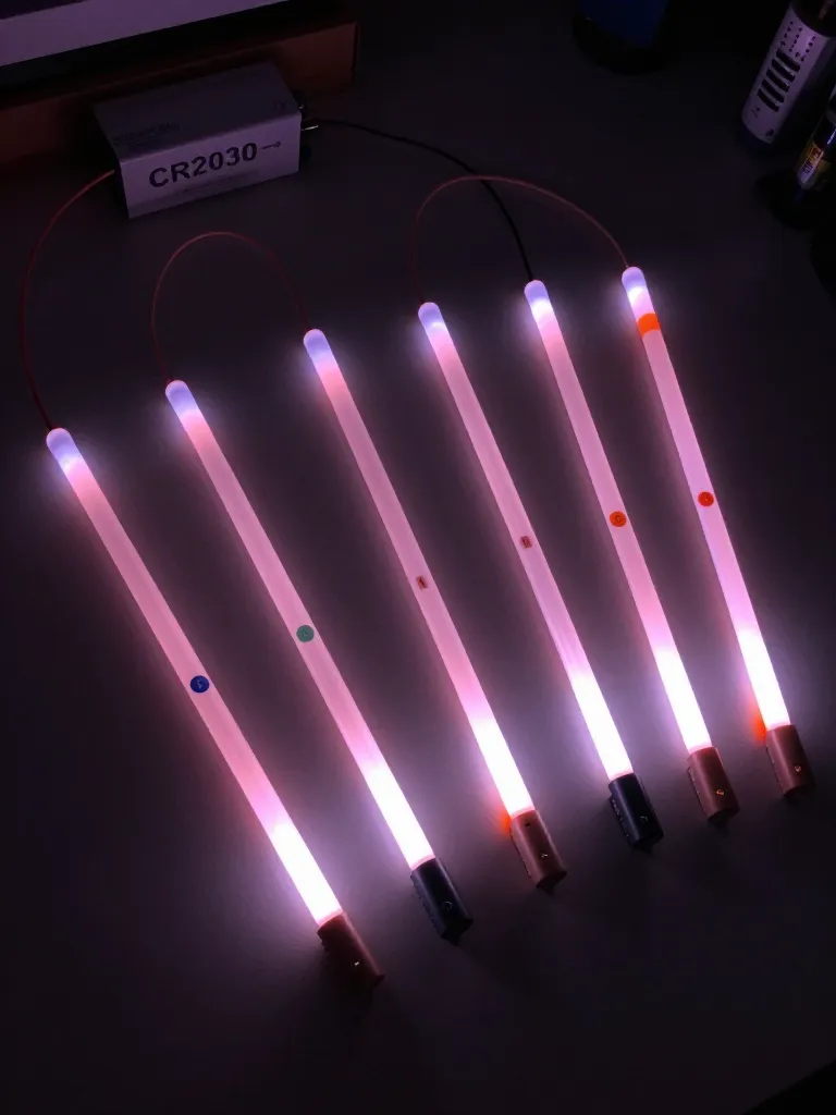 Fiber-optic gill stalks glowing pink-purple during battery testing